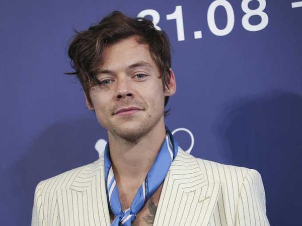 Watch: Harry Styles, in Concert, Jokes about Spitting on Chris Pine